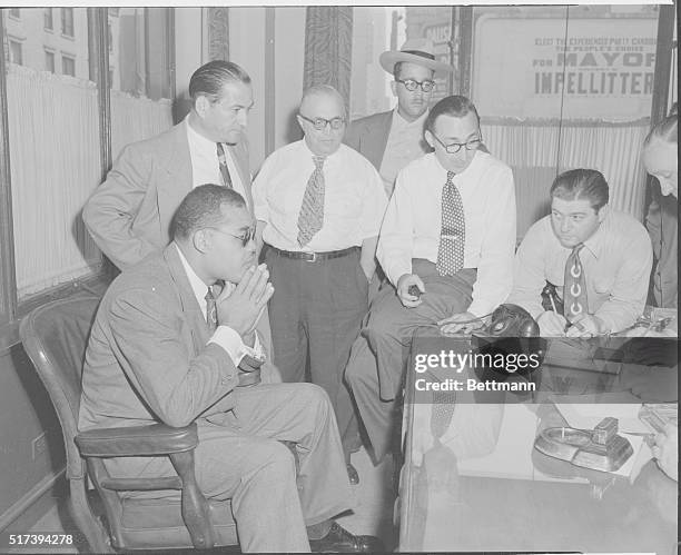 New York: May Try Again. Joe Louis talks to reporters during a press conference at the International Boxing Club in New York, Oct. 2. The erstwhile...