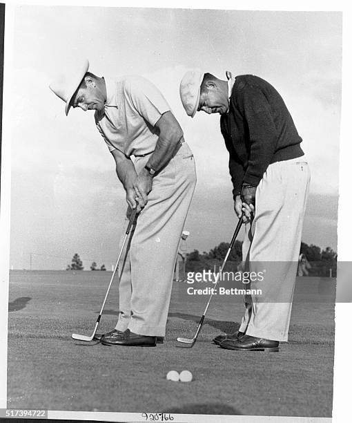 From the looks of things, there just isn't enough room in one hole when two golfers such as Sam Snead and Johnny Palmer putt together on the same...
