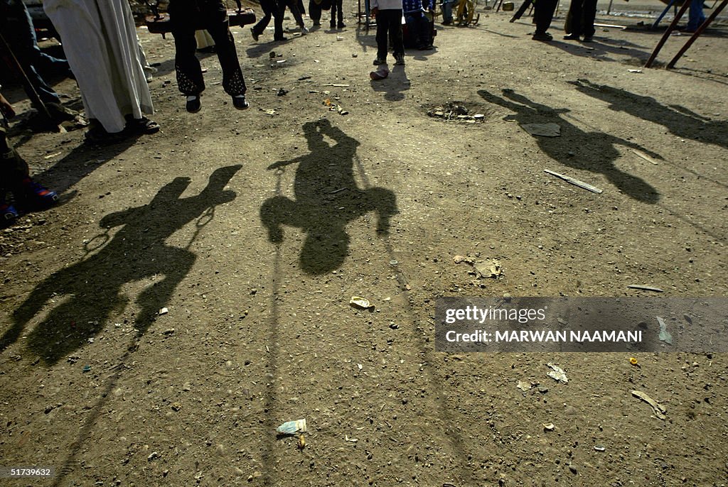 https://media.gettyimages.com/id/51739632/photo/the-shadows-of-iraqi-children-playing-on.jpg?s=1024x1024&w=gi&k=20&c=6djbBQFjzWxouqMFnRQj-EC5TyUnT7GiGx8xG8TQO3A=