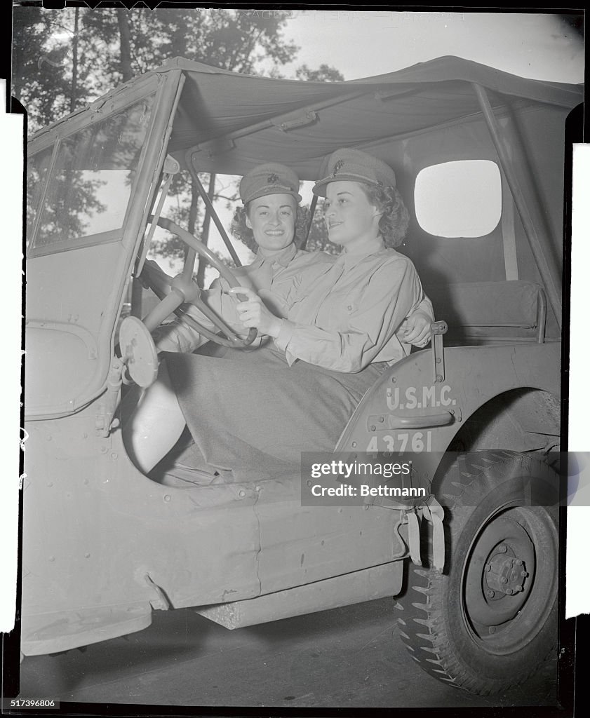 Marine Sisters Riding in Military Vehicle
