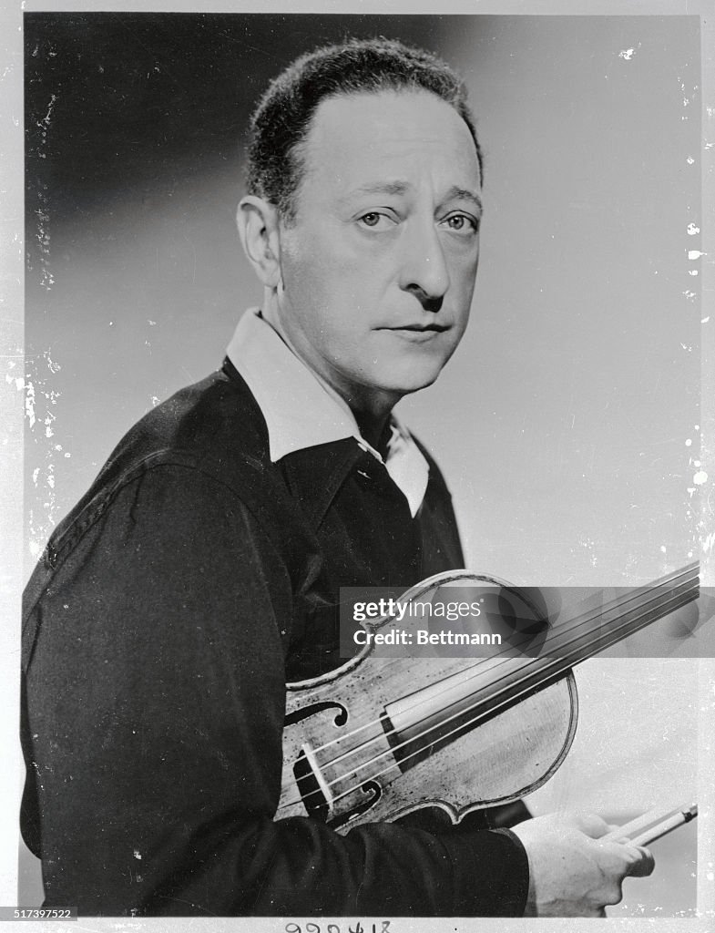Portrait of Jascha Heifitz Holding Violin