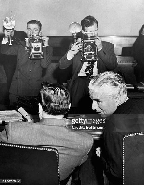 The Cameramen Were There. Los Angeles, California: As the Charles Chaplin trial got underway here today, Los Angeles press photographers turned out...