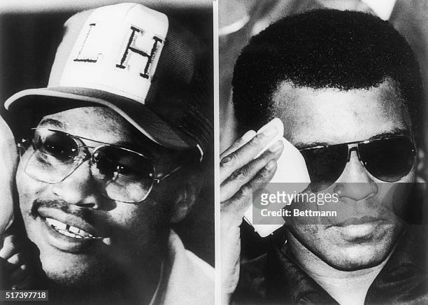 Heavyweight champion Larry Holmes is all smiles at a joint news conference with defeated champ Muhammad Ali . Ali appeared at the press conference...