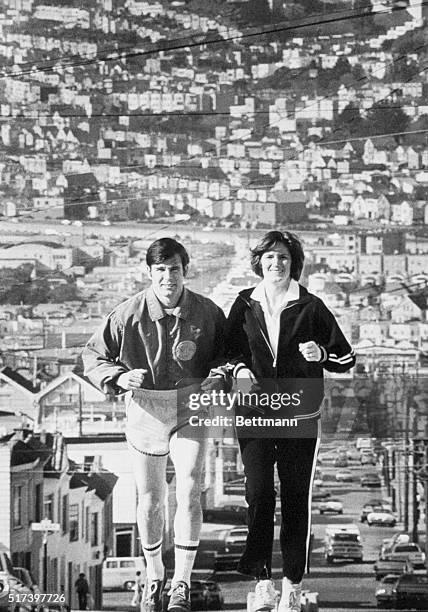 Ex-Supervisor Dan White, who is being held in the fatal shooting of San Francisco Mayor George Moscone and Supervisor Harvey Milk, jogs up a hill in...