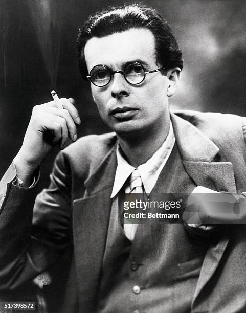 Portrait of Aldous Huxley , novelist and essayist smoking a cigarette. BPA2
