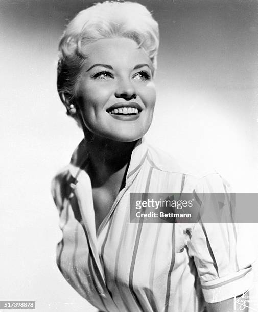 New York, NY- Patti Page, singing star whose records have sold more than 35 million copies, and star of the TV show "The Big Record," worries about...
