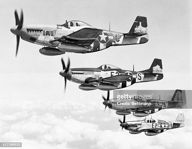 Members from the 375th Fighter Squadron of the 361st Fighter Group fly their P-51 Mustangs over England. | Location: Near England, UK.