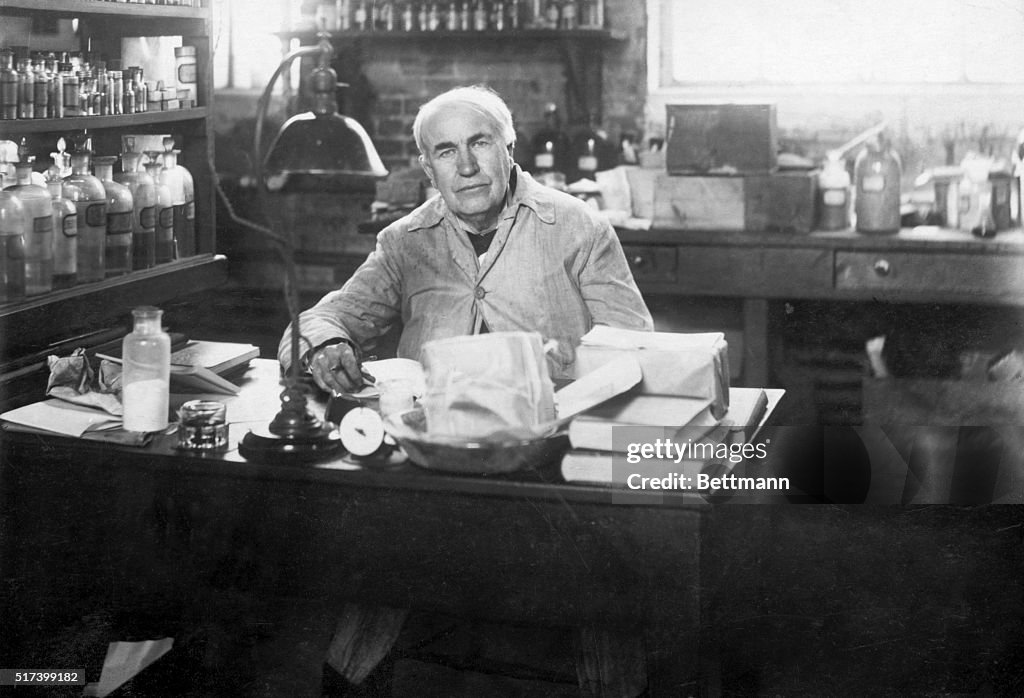 Photo shows Thomas Edison seated at his desk in a chemical... News ...