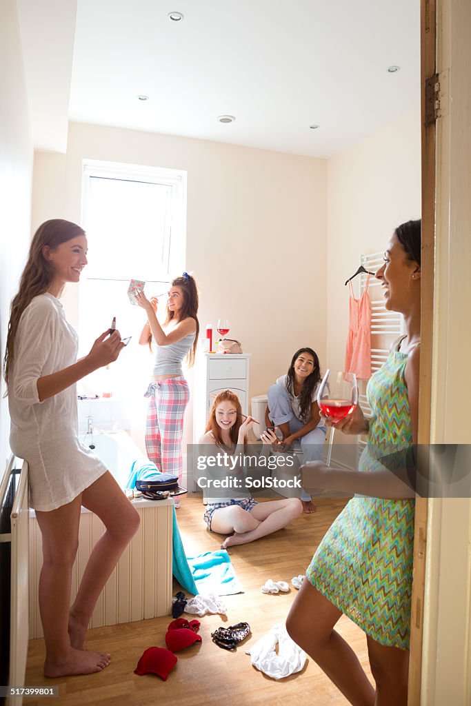 Young Women Applying Make-Up