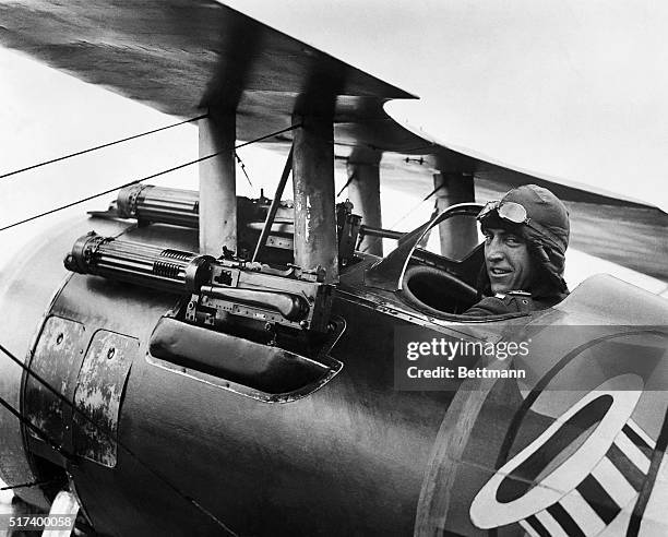 World War I fighter pilot Eddie Rickenbacker, known as the "ace of aces", sits in his Spad XIII fighter plane.