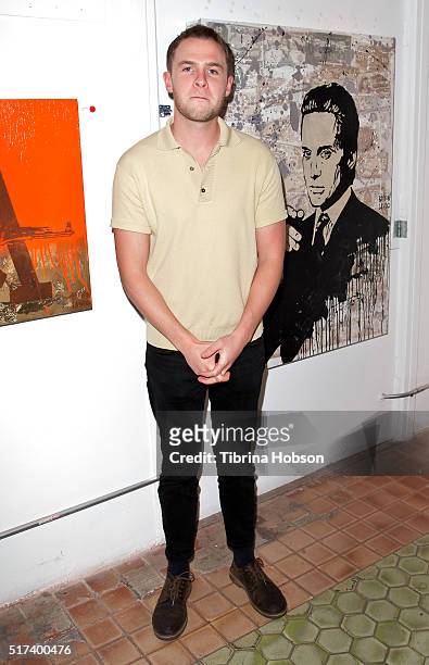 Iain De Caestecker attends Bryden Lando's 'Happiness Is Too Expensive' gallery opening at LAB ART on March 24, 2016 in Los Angeles, California.