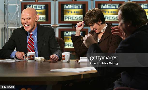 Moderator Tim Russert and Republican strategist Mary Matalin react after Matalin's husband, Democratic strategist James Carville , cracked an egg on...