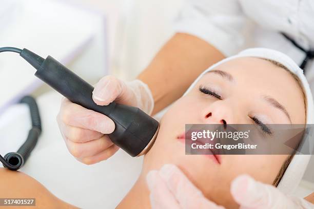 face treatment - laser stockfoto's en -beelden