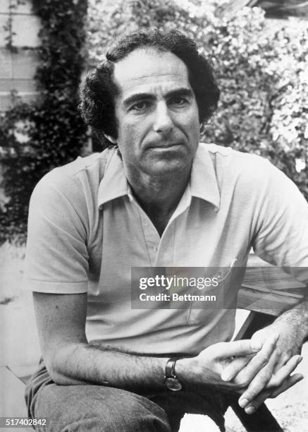 Philip Roth, author. Seated and wearing sport shirt.