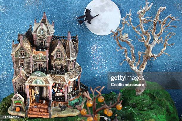 model halloween spooky-town, witches, haunted-house, flying witch, broomstick, full-moon - haunted mansion exterior stock pictures, royalty-free photos & images