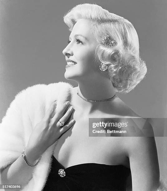 Film actress Marilyn Maxwell has been chosen as the "Diamond Blonde" by the Diamond Manufacturers and Importers Association of America.