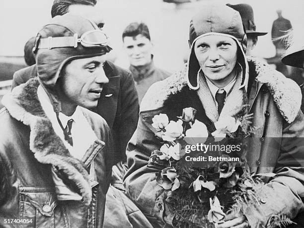 Amelia Earhart and Wilmer Stutz upon arriving at South Hampton. Wilmer Stutz was the pilot and Amelia Earhart was the passenger, making her the first...