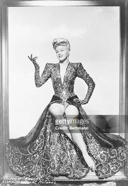 Ginger Rogers wears the gown, worth close to $6 she dawns in the 1944 comedy Lady in the Dark. The blouse is made of red and gold sequins and she...