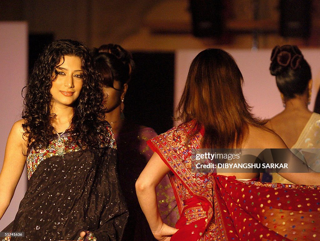 Indian models display creations by desig