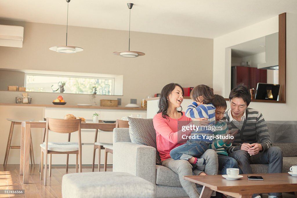 Family relaxing in the living room