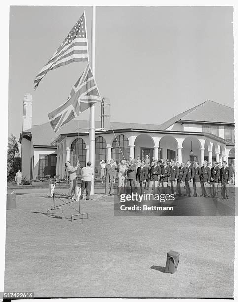 The American and British flags are hoisted at the Pinehurst, North Carolina, Country Club, after the British team arrived at the club for the Ryder...
