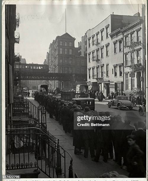 Long bread line in the New York Bowery during the Depression.