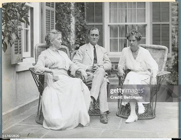 Franklin Delano Roosevelt, here, at the end of his term as Assistant Secretary of the Navy, seated with Sara Delano Roosevelt , his mother, and Anna...