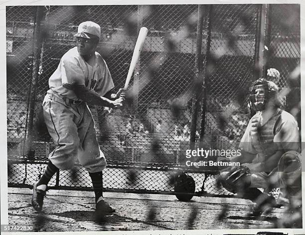 Bronx, New York: Second baseman Henry Thompson, born in Dallas, Texas, and raised in Los Angeles, California, gets ready to swat one in batting...