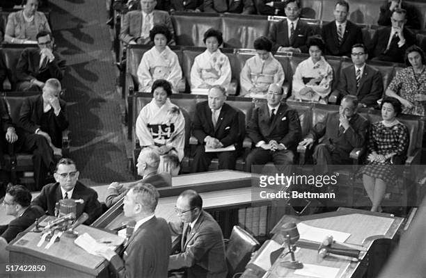 Japanese Prime Minister Hayato Ikeda addresses the House of Representatives here today. He was warmly applauded by the Congressmen. Ikeda's wife and...
