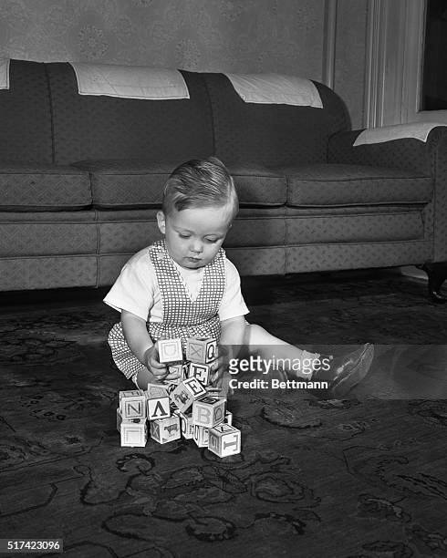 Boy playing with blocks. Francis A. Leigh Robert J. Philips-Model Gordon Philips- Parent