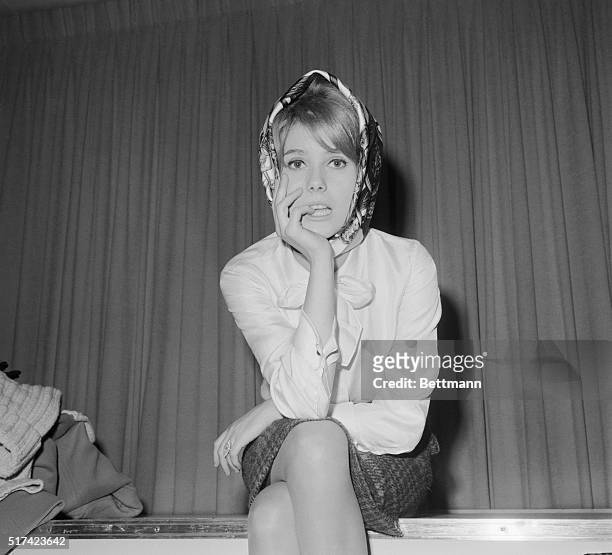 French Dish. Queens, New York, New York: Sitting pretty at Idlewild is actress Catherine Deneuve who flew in from Paris with the man she'll wed. He...