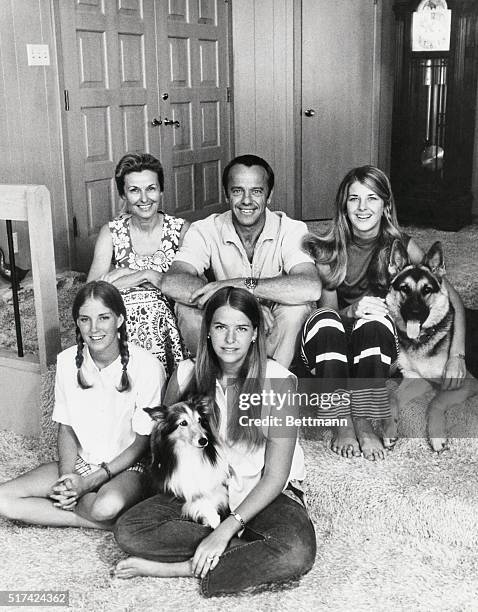 Apollo 14 Mission Commander Alan B. Shepard Jr., relaxes here with his family at home near the Houston Manned Spacecraft Center in Texas. Astronaut...