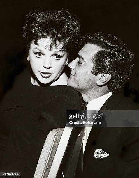 Long time admirer of Judy Garland's talents pal Tony Curtis, welcomes the veteran singer back to the social swirl of Hollywood... Judy had just...