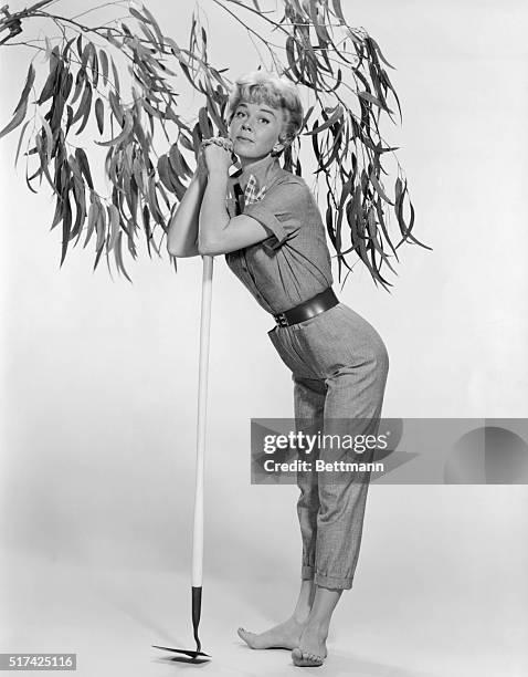 Part of this day is posing in clothes for every occasion. Here Doris shows her version of the famous poem "Man with the Hoe" - "Here, ho's this?"...