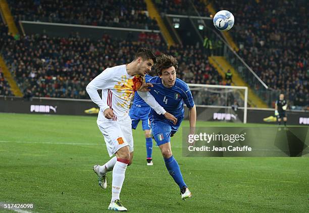 Alvaro Morata of Spain and Matteo Darmian of Italy in action during the international friendly match between Italy and Spain at Stadio Friuli on...