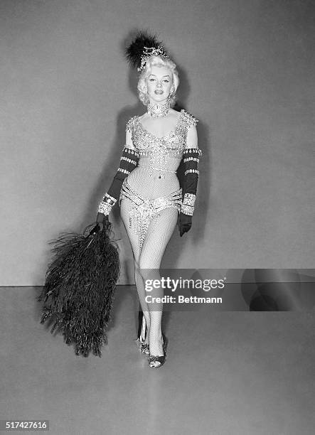 Actress Marilyn Monroe in the head-to-toe peek-a-boo costume she wore for the Jewelers' Association display in New York.