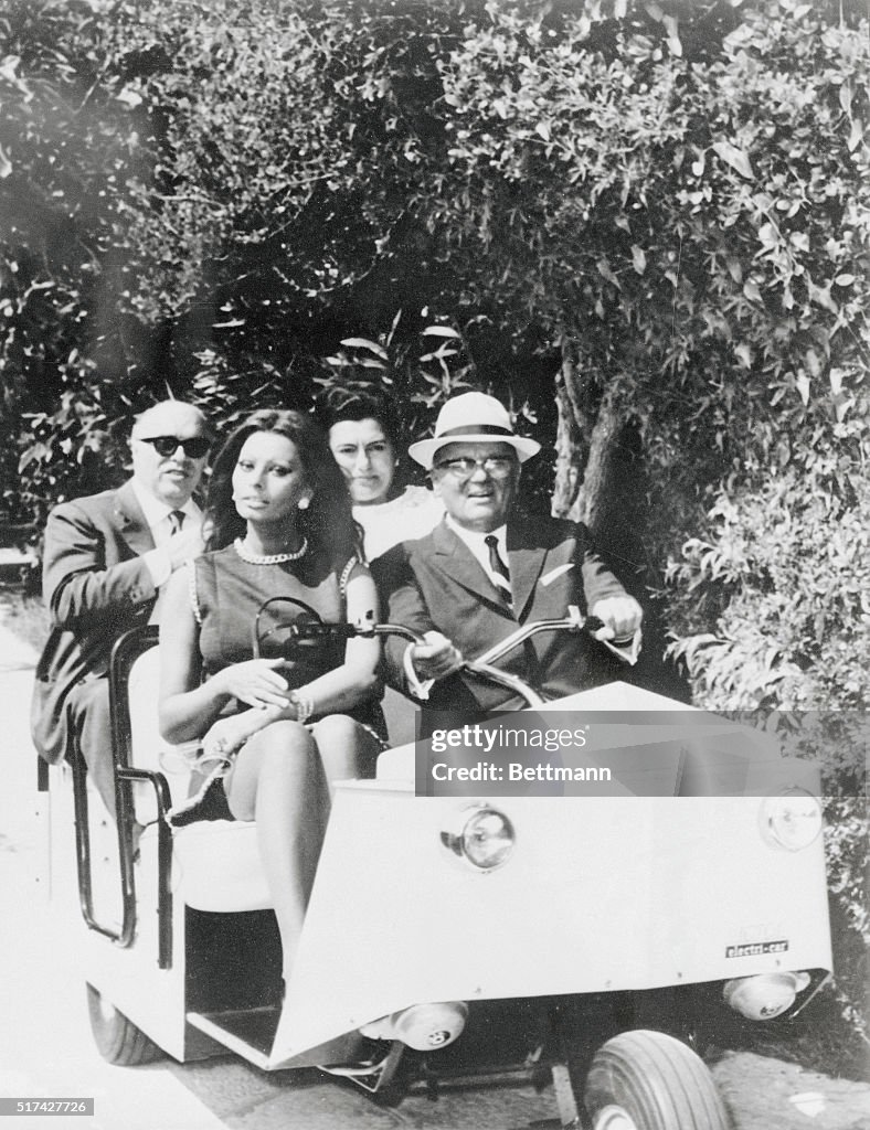 Josip Broz Tito Riding in a Cart with Colleagues