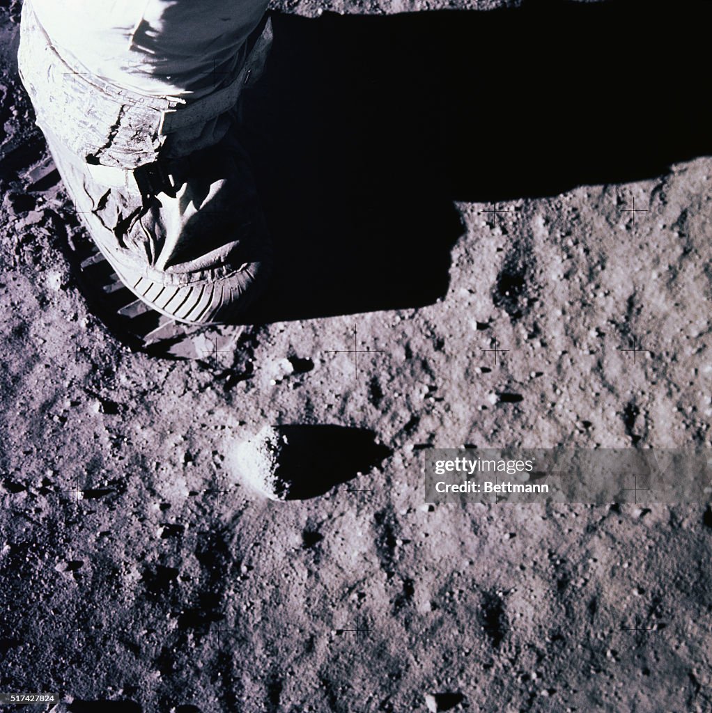 Neil Armstrong Planting Boot onto Moon Surface