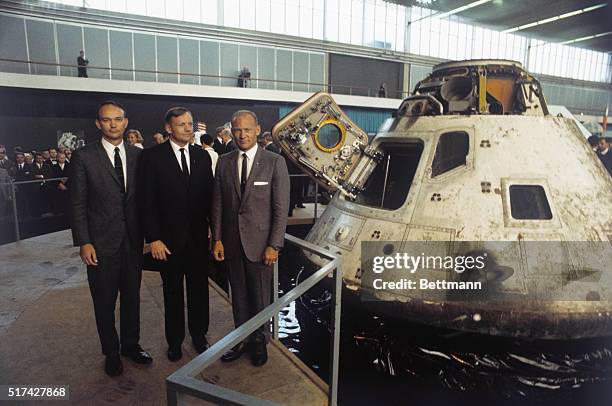 Apollo 11 astronauts visiting Amsterdam on their global good will tour at and next to apollo 8 capsule at space exhibit here October 9th. Left to...