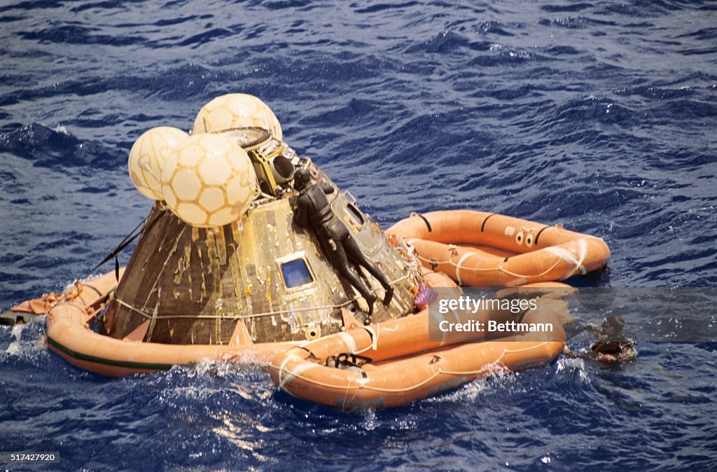 Navy Frogman Climbing onto the Lunar Module