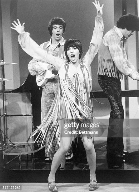 Liza on the Move. Liza Minnelli, with the Bojangles, swings into a mod medley of contemporary tunes in Movin, fast paced hour of music and comedy,...