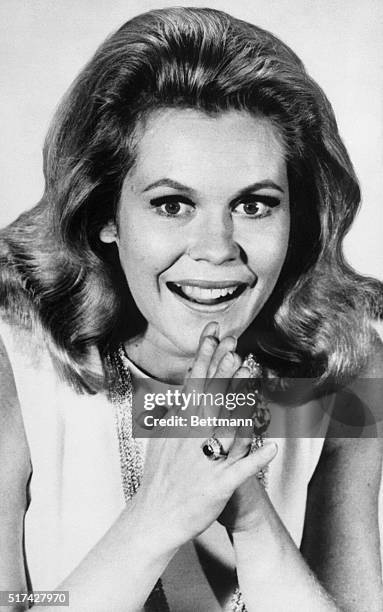 Elizabeth Montgomery Smiling with Her Hands Clasped