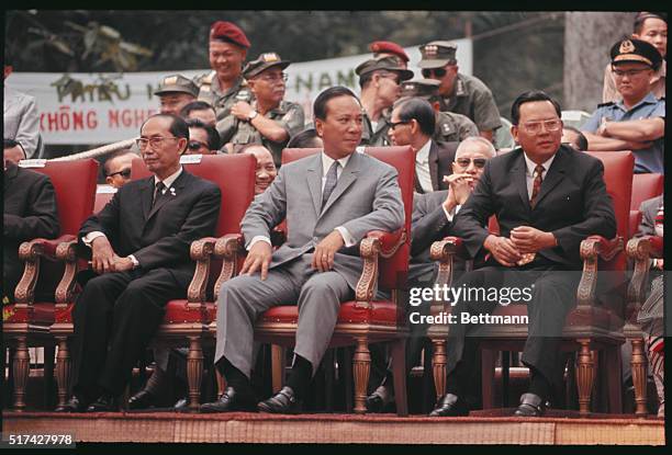 Saigon, South Vietnam: Left to right, Chairman of Lawhouse Nguyen Ba Luong, President Nguyen van Thieu, Prime Minister Tram Thien Khiem, and Madame...