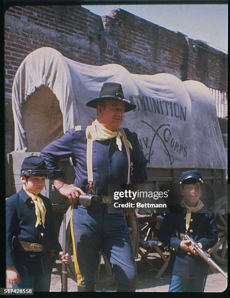 Cuernavaca, Mexico: Actor John Wayne with a 8-year-old son John Ethan Wayne on set of Rio Lobo.