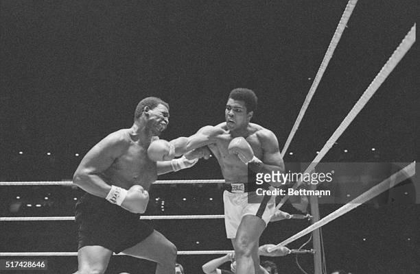 Muhammad Ali lands a right to the head of Buster Mathis in fourth round of heavyweight bout in Astrodome 11/17. Ali took a 12-round decision.