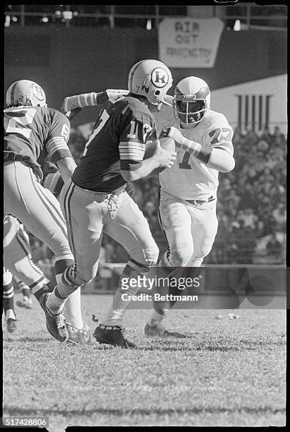 Washington: Philadelphia's right tackle Ernie Calloway sets his sights on Washington quarterback Bill Kilmer , in the second quarter November 7, but...