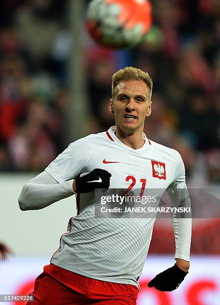 Poland's Lukasz Teodorczyk plays the ball during the international friendly football match against Serbia on March 23, 2016 in Poznan. / AFP / JANEK...