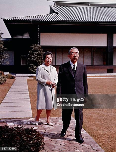 Tokyo, Japan: Emperor Hirohito and Empress Nagako in garden of Imperial Palace during a walk.