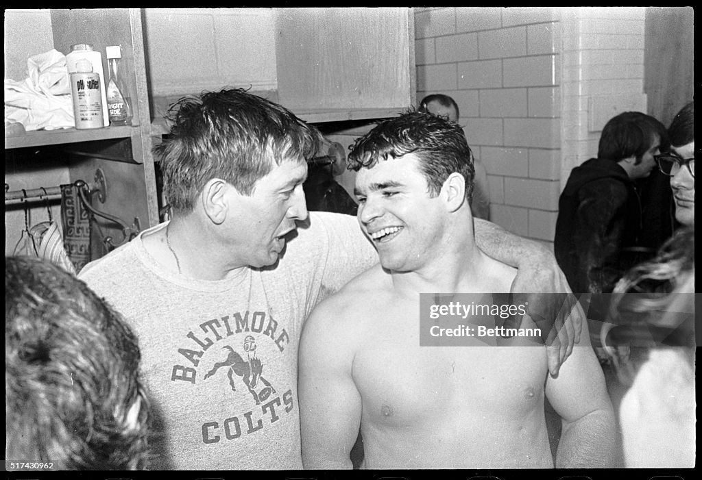 Johnny Unitas Grabs Don Nottingham