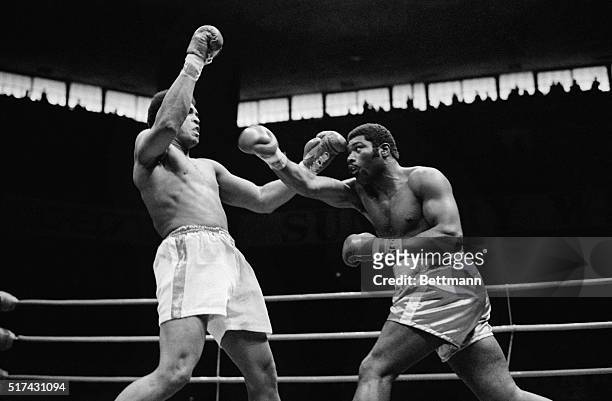 Muhammad Ali dodges a right thrown by Mac Foster in first round of their 15-round non-title bout here March 31st. Ali scored a unanimous decision...